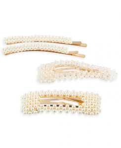 Hair barrettes pearl and crystal.